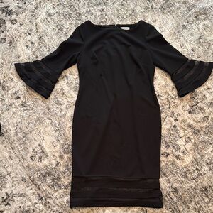 Elegant Black Dress with Flared Sleeves